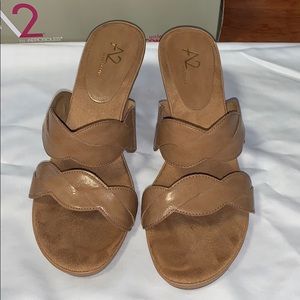 Twisted strap slip on sandals